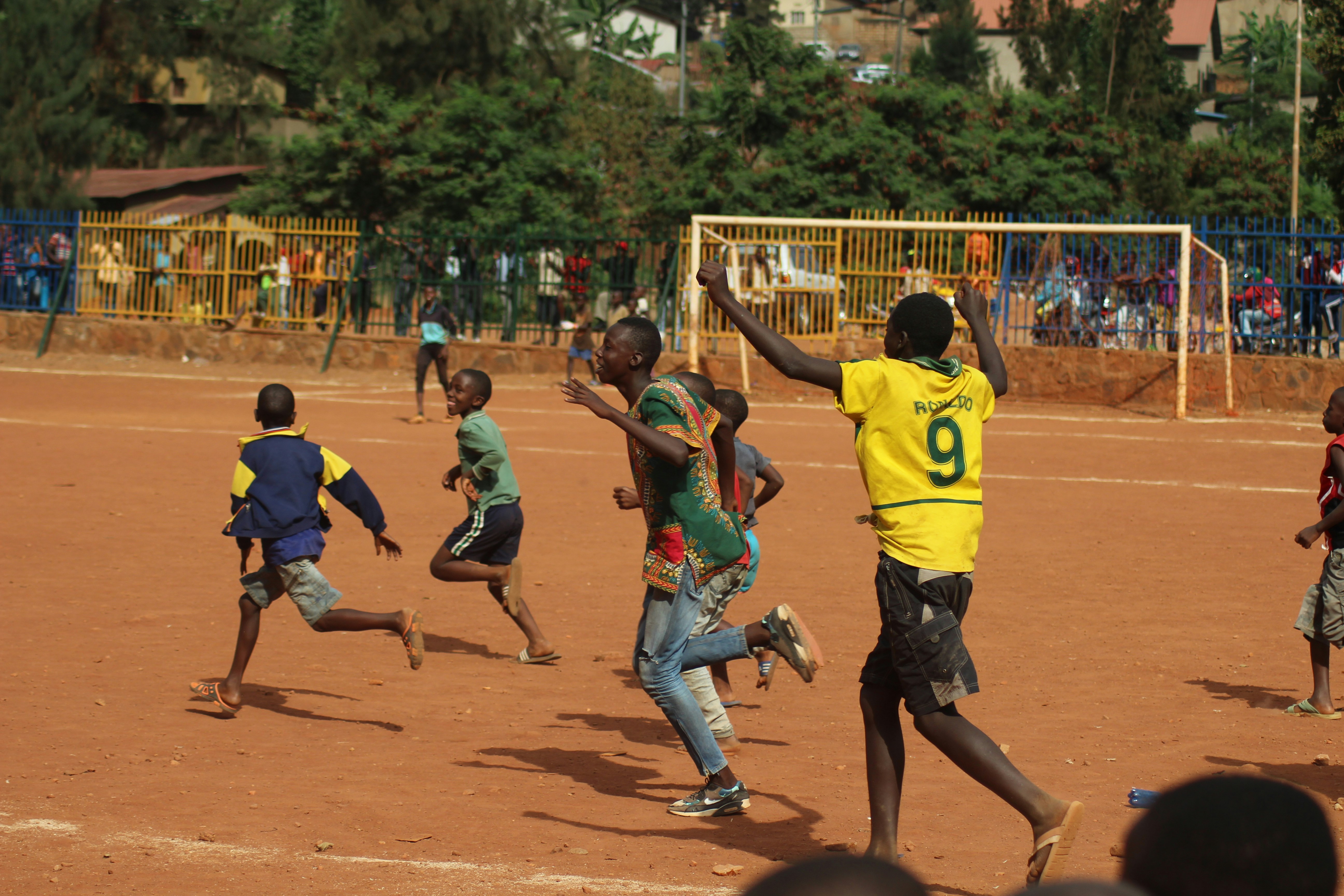 A youth soccer team in action during a community sports day